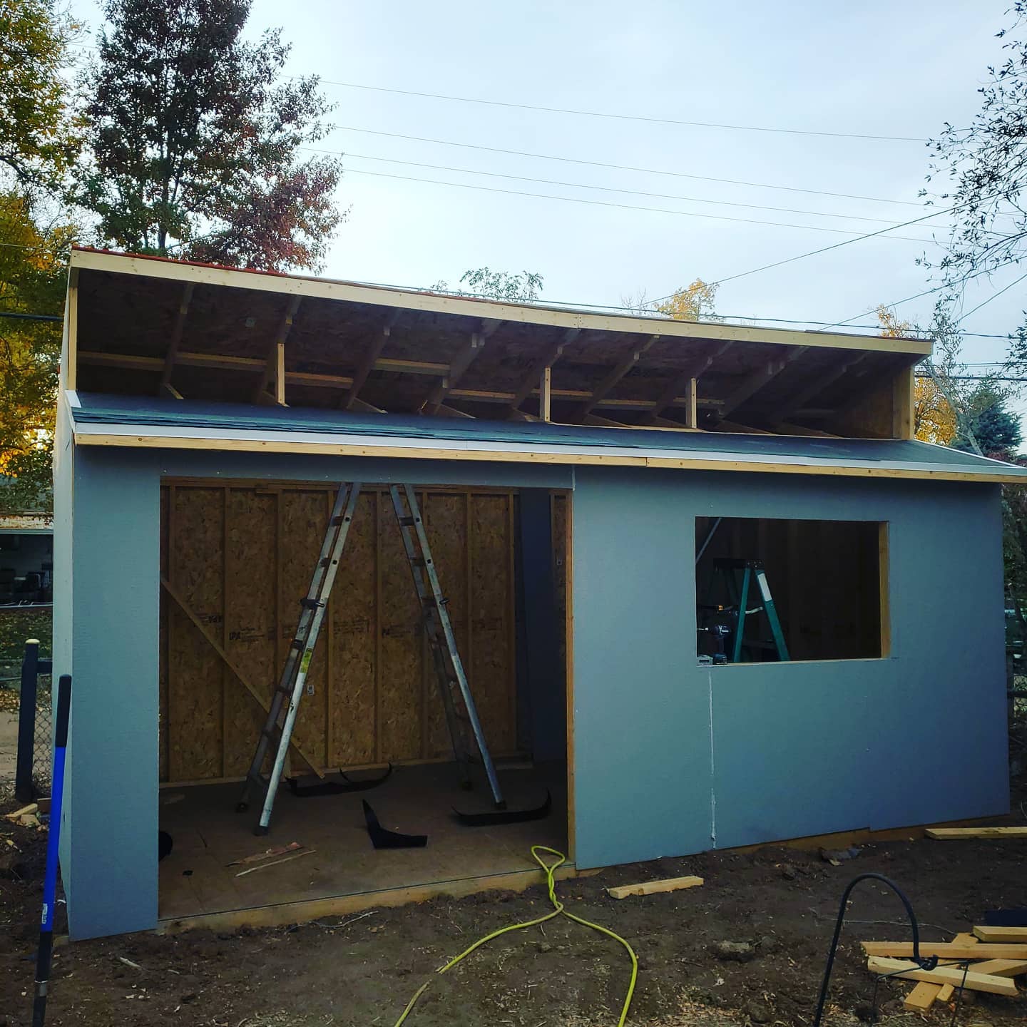 An outside shot of the shed when it was 75% finished, but missing doors and windows.