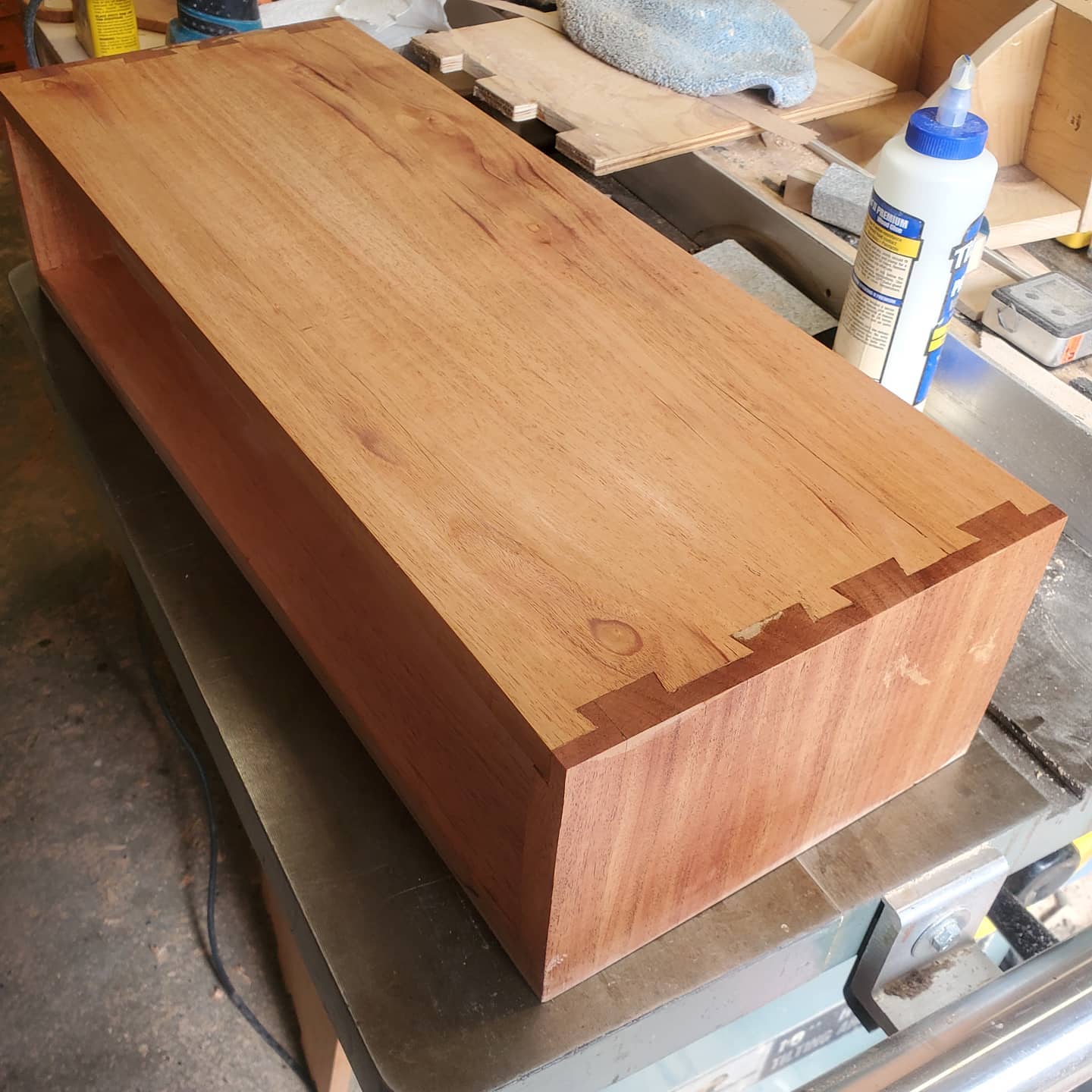 A mahogany head-shell for a bass amplifier with dovetail joints.
